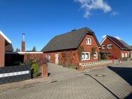 Charmantes Einfamilienhaus auf einem Eigentumsgrundstück mit Garage, Wintergarten und Werkraum zu verkaufen. - Emden