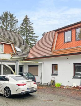 Besonderes Zweifamilienhaus mit zusätzlicher Einliegerwohnung in Loxstedt - Loxstedt