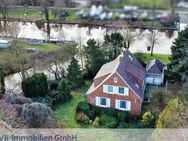 Ostfriesische Idylle in direkter Wasserlage - Baugrundstück mit Abrisshaus gegen Gebot! - Moormerland
