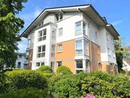 PURNHAGEN-IMMOBILIEN - Oberneuland - gepfl. Eigentumswohnung mit Balkon u. Tiefgarage in ruhiger Lage - Bremen