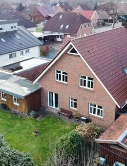 Vermietetes Zweifamilienhaus mit solider Rendite in ruhiger Lage - Saterland