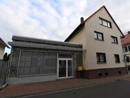 **VISTA Immobilien** Zwei-Familienhaus mit Ladenfläche, Innenhof und Garage - Reinheim