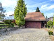 Natur trifft Wohnen! Idyllisches Einfamilienhaus mit herrlichem Grundstück! - Wüstenrot