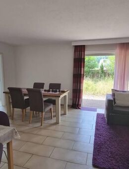 Großzügige 4-Zimmer-Erdgeschosswohnung mit Terrasse, Garten und Carport in Büsingen - Büsingen (Rhein)