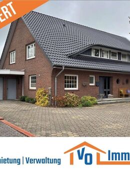 Doppelhaushälfte mit freiem Blick auf Felder und Wiesen in Zentrumslage von Uplengen-Remels - Uplengen