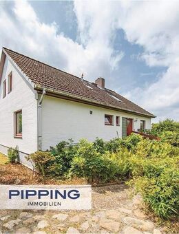 Einziehen und Wohlfühlen: "Gemütliches Einfamilienhaus mit Einliegerwohnung in Ruhelage" - Wohltorf