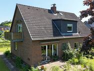Teilvermietetes Einfamilienhaus mit Einliegerwohnung in schöner Lage von Hartenholm - Hartenholm