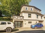 Vermietetes Stadthaus in einer hübschen Seitengasse mit Wohnbalkon und geräumiger Garage - Wissen