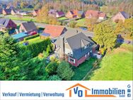 Solides Wohnhaus mit 3 Wohneinheiten in südöstlich unverbauter Kanallage von Wiesmoor - Wiesmoor