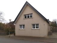 Einfamilienhaus mit Anbau, kl. "Wintergarten" und Garage - Cuxhaven
