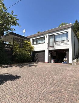 Sanierungsbedürftiger Bungalow aus Nachlass mit Wintergarten und 2 Garagen - aktuell vermietet - Neunkirchen (Saarland)