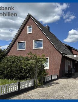 Generationenfreundliches Wohnen: Ihr großzügiges Mehrfamilienhaus mit moderner PV-Anlage - Ostrhauderfehn