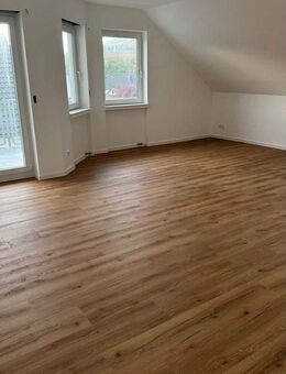 Charmante Dachgeschosswohnung mit Balkon - Erstbezug nach Renovierung in ruhiger Wohnlage - Rheinböllen