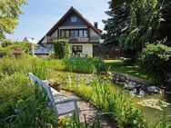 Wohnen auf höchstem Niveau - Freistehendes Einfamilienhaus mit Einliegerwohnung & Parkgarten in Heroldsberg - Heroldsberg