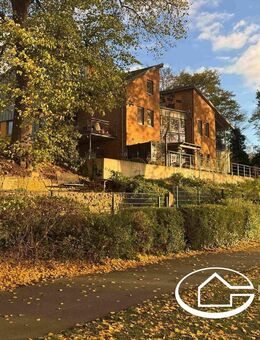 Von Ihrem IMMO.PARTNER: "Wohnensemble am Weserufer" - Erdgeschosswohnung mit Garten und Weserpanorama - Nienburg (Weser)