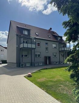 gepflegte Wohnung mit 2 Garagen und Kleingarten - Schönwölkau