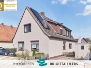 Achim - Charmant gestaltetes 2-Familienhaus mit großem Garten, Pool, PV-Anlage und Doppelgarage - Achim