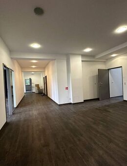 Wohn- und Bürogebäude mit Ausbaupotenzial - München