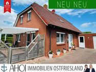 Perfekt für die Familie: Gepflegtes Einfamilienhaus mit Garage und sichtgeschütztem Garten - Krummhörn