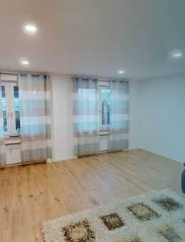 **Wohlfühlen in idyllischer Lage: Modernisierte 3-Zimmer-Wohnung mit EBK und großer Terrasse** - Kemmenau