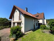Zwei Häuser auf einem gepflegten Grundstück in ruhiger Lage von Fuldabrück-Dittershausen! - Fuldabrück