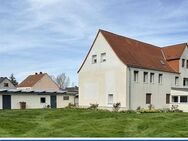 Vielseitig nutzbares Mehrfamilienhaus mit Garagen, Solaranlage und großem Grundstück im Stadtteil Alt Olvenstedt - Magdeburg