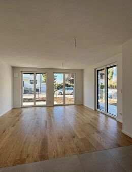 Helle 3-Zimmer-Erdgeschosswohnung mit zwei Terrassen und Garten - München