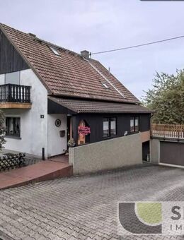 Freistehendes Ein- Zweifamilienhaus mit Doppelgarage in ruhiger Lage - Heusweiler