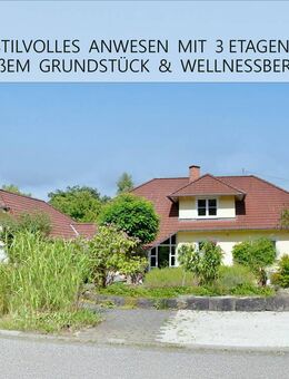 Stilvolles Architektenhaus mit Einliegerwohnung, Wellnessbereich, Fernblick & großem Grundstück! - Münchwald
