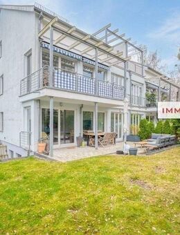 IMMOBERLIN.DE - Exzellente Wohnung mit Südwestterrasse, 150 m2 Garten & Pkw-Stellplatz in familienfreundlicher Lage - Berlin