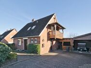 Einfamilienhaus mit Garage und großem Grundstück in ruhiger Siedlungslage in Aschenstedt - Dötlingen