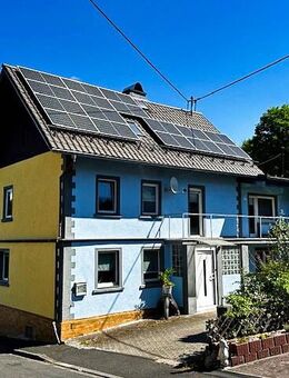 Einfamilienhaus mit Garage, Garten, Nebengebäude und PV-Anlage in Isselbach - Isselbach