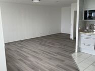 Exklusive hochwertig renovierte Wohnung mit Balkon, neue EB-Küche und Tiefgaragenstellplatz - Heidelberg