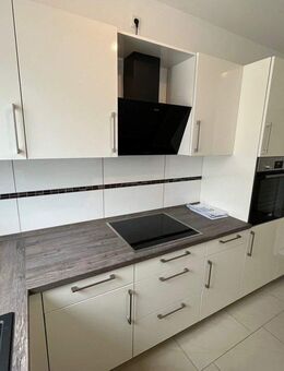 Wohnen am Deich: Lichtdurchflutete 2-ZKB mit Balkon und Fernblick - Lemwerder