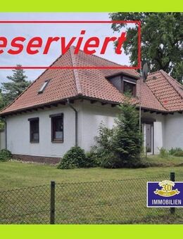 Walmdach Winkelbungalow mit Teilkeller, Doppelgarage, in begehrter Lage in Fahrenhorst - Stuhr