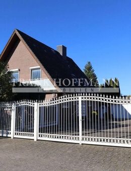 Platz für die ganze Familie: Einfamilienhaus mit großem Grundstück und Doppelgarage in Bönningstedt - Bönningstedt