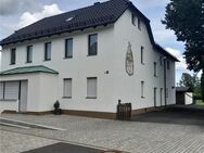 Mehrfamilienhaus mit großem Garten, Garagen und Baugrundstück - Mitterteich