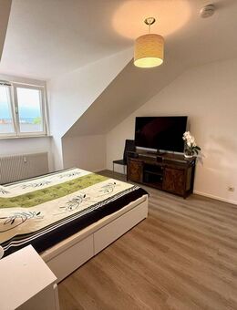Attraktive Kapitalanlage in Grenznähe - vermietete 2-Zimmer-DG-Wohnung mit TG-Stellplatz - Lörrach