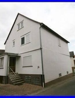 Einfamilienhaus mit Doppelgarage, Nebengebäude u. sep. Gartengrundstück in 34599 Neuental-Waltersbrück zu verkaufen - Neuental