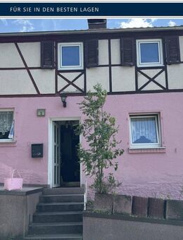 Verkauf: Schnuckeliges Einfamilienhaus mit Weitblick und Sanierungsbedarf in Höhenlage von Höchberg - Höchberg