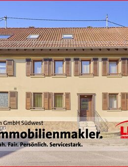 3 Familienhaus mit 4 großen Garagen, PV- Anlage und parkähnlich angelegtem Garten! - Mannweiler-Cölln