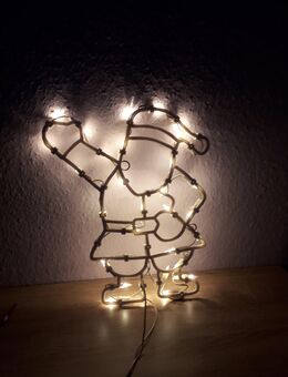 Fensterbild Weihnachtsmann mit Kabel und weissen Lämpchen - Euskirchen Zentrum