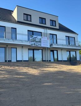 PROVISIONFREIE* 3-Zimmer Eigentumswohnung im Souterrain mit Terrasse - Puderbach