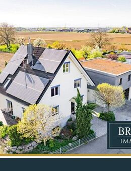 BRUMANI | Modernes Einfamilienhaus mit hochwertigem Anbau, Doppelgarage und Pool in Buggingen - Buggingen