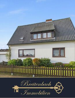 Achim-Uesen . Solides Einfamilienhaus mit Einliegerwohnung - Achim