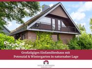 Großzügiges Einfamilienhaus mit Potenzial und Wintergarten in naturnaher Lage - Henstedt-Ulzburg