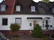 "Ein Schmuckstück in der Altsiedlung" Saniertes Reihenmittelhaus mit Garten und Doppelgarage - Kamp-Lintfort