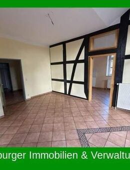 Fachwerkflair trifft Naturidylle — 3-Zimmer-Erdgeschosswohnung in Exten am Bachlauf - Rinteln