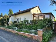 Freistehendes Einfamilienhaus mit Garten und Garage in Hünstetten-Limbach - Hünstetten