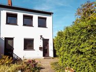 Reihenendhaus mit großem Grundstück und Garage. - Oyten